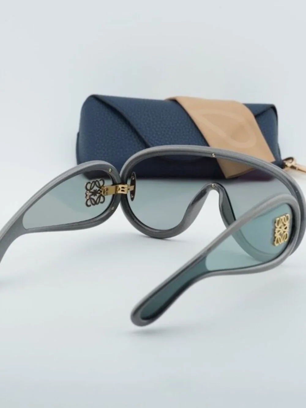 Loewe Gray Curved Frame Sunglasses with Gold Anagram Detail