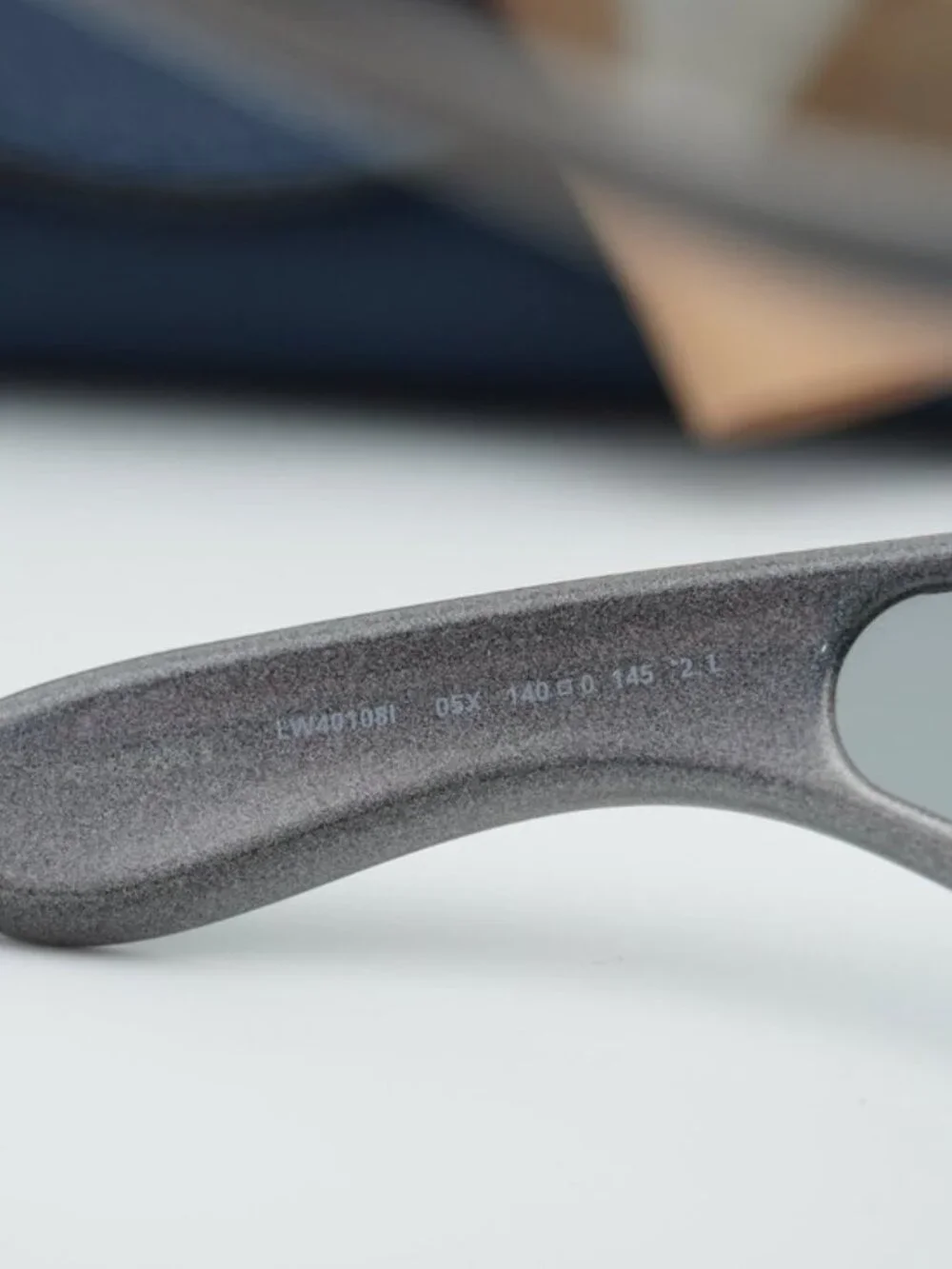 Loewe Gray Curved Frame Sunglasses with Gold Anagram Detail