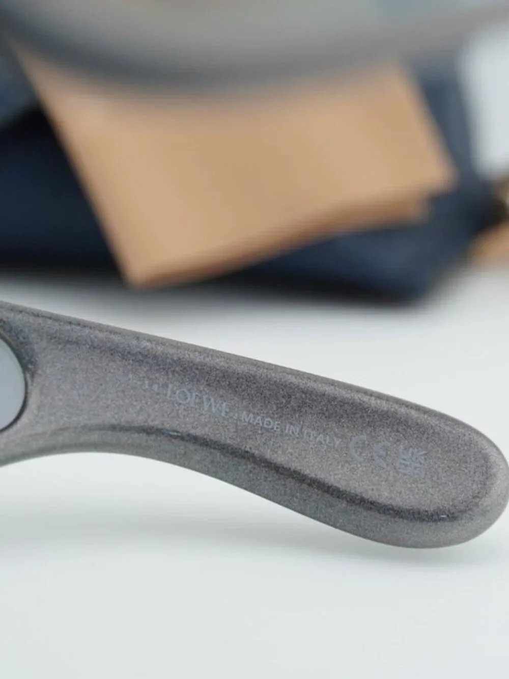 Loewe Gray Curved Frame Sunglasses with Gold Anagram Detail