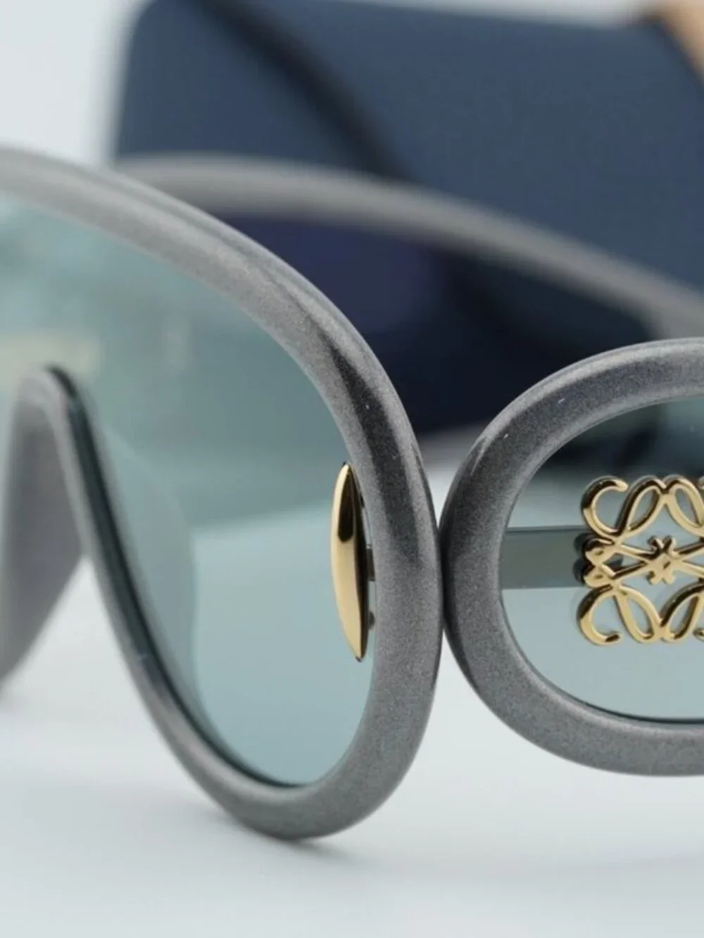 Loewe Gray Curved Frame Sunglasses with Gold Anagram Detail