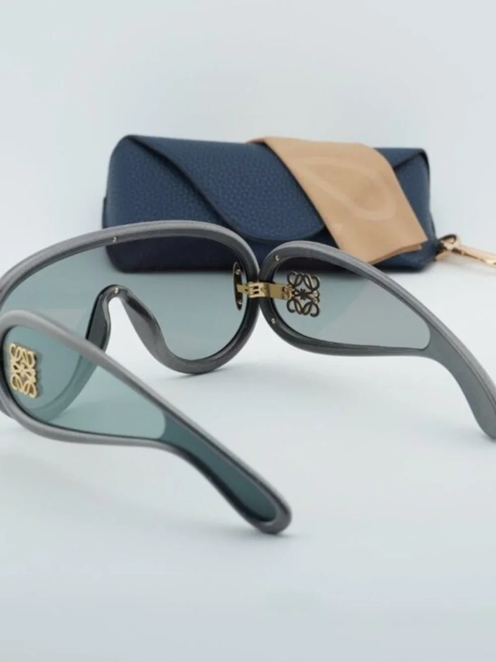 Loewe Gray Curved Frame Sunglasses with Gold Anagram Detail