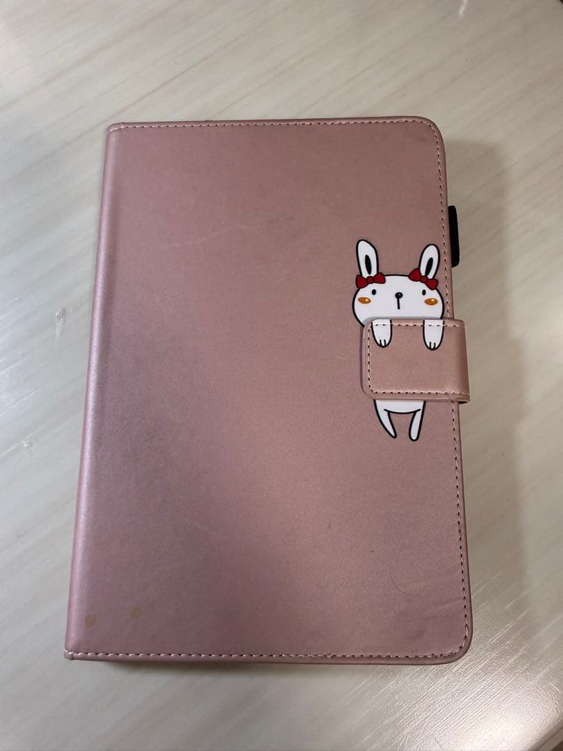 Pink tablet case with rabbit illustration